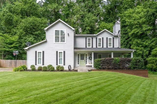 361 Princeton Way, Lawrenceville, GA 30044 - view of front of house with a chimney, a porch, and view of wooded area