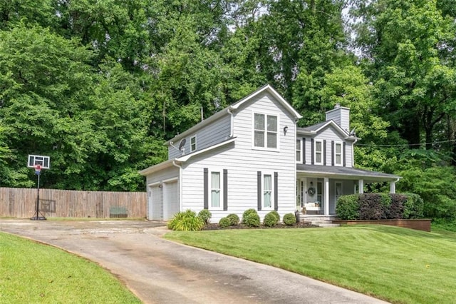 361 Princeton Way, Lawrenceville, GA 30044 - view of front of property with a chimney, a porch, driveway, and a garage