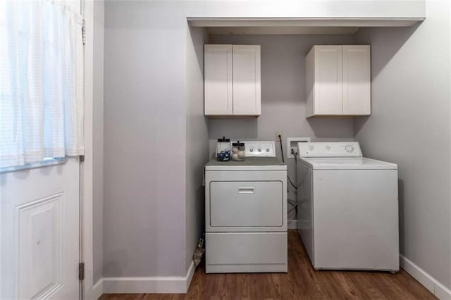 361 Princeton Way, Lawrenceville, GA 30044 - laundry area featuring washing machine and clothes dryer, wood finished floors, and cabinet space