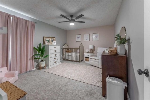 361 Princeton Way, Lawrenceville, GA 30044 - carpeted bedroom with a textured ceiling and a ceiling fan