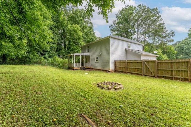 361 Princeton Way, Lawrenceville, GA 30044 - view of yard with an outdoor fire pit and a deck