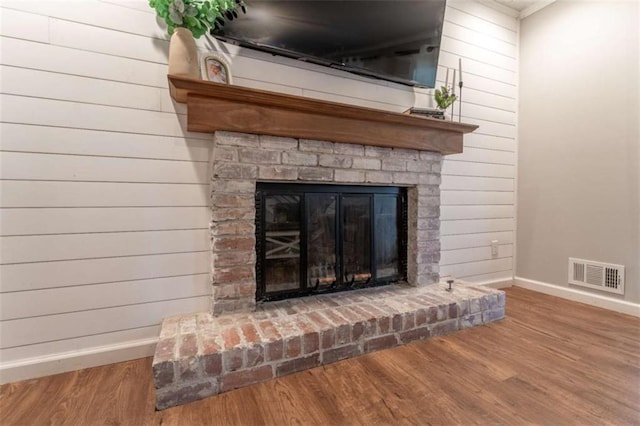 361 Princeton Way, Lawrenceville, GA 30044 - detailed view of a brick fireplace, wood finished floors, and crown molding
