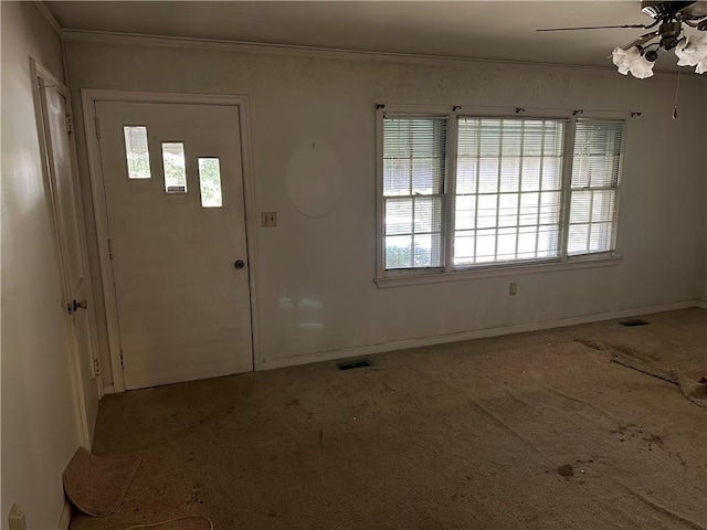 entrance foyer featuring ceiling fan