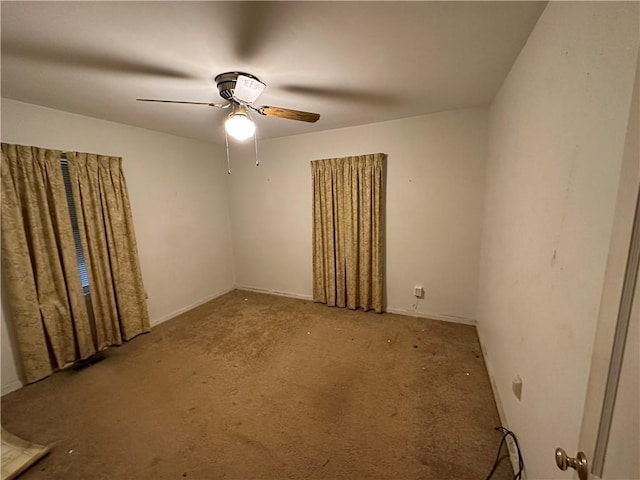 spare room with ceiling fan