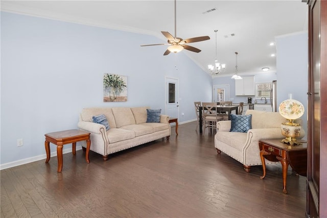 541 Mulberry Cir, Jasper, GA 30143 - living room featuring sink, dark wood-type flooring, high vaulted ceiling, crown molding, and ceiling fan with notable chandelier