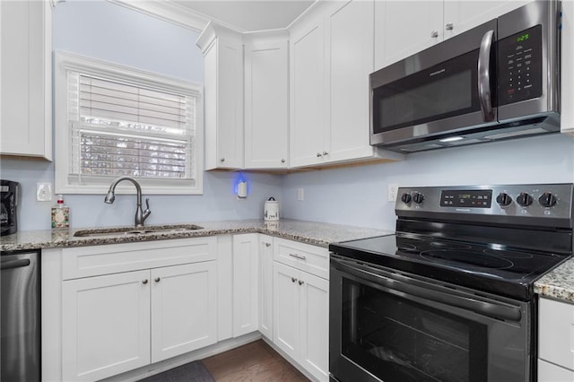 541 Mulberry Cir, Jasper, GA 30143 - kitchen with white cabinets, appliances with stainless steel finishes, and sink