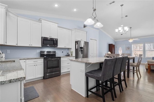 541 Mulberry Cir, Jasper, GA 30143 - kitchen with white cabinetry, hanging light fixtures, stainless steel appliances, and a center island