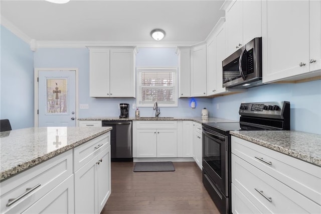 541 Mulberry Cir, Jasper, GA 30143 - kitchen with sink, appliances with stainless steel finishes, white cabinets, and light stone counters