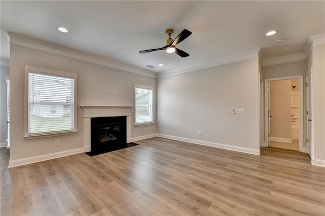 2090 Harvester Ln, Buford, GA 30518 - unfurnished living room with ceiling fan, ornamental molding, wood finished floors, a fireplace with flush hearth, and recessed lighting