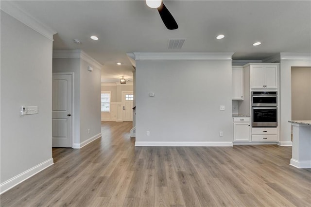 2090 Harvester Ln, Buford, GA 30518 - unfurnished living room with crown molding, a ceiling fan, light wood finished floors, and recessed lighting
