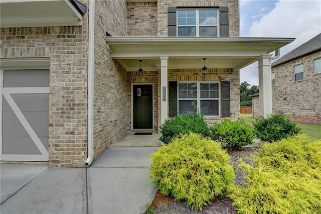 2090 Harvester Ln, Buford, GA 30518 - entrance to property featuring brick siding and a porch