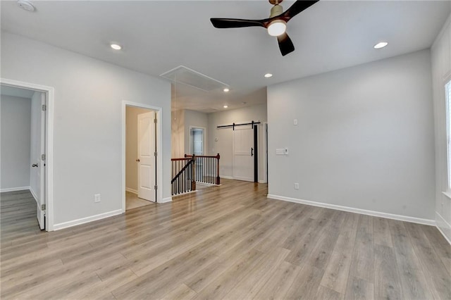 2090 Harvester Ln, Buford, GA 30518 - empty room with attic access, a ceiling fan, light wood-style floors, recessed lighting, and a smoke detector