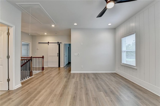 2090 Harvester Ln, Buford, GA 30518 - spare room with attic access, ceiling fan, light wood-style flooring, and recessed lighting