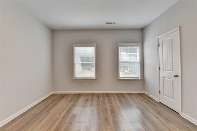 2090 Harvester Ln, Buford, GA 30518 - empty room featuring light wood-type flooring and baseboards