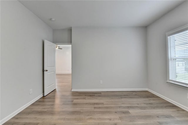 2090 Harvester Ln, Buford, GA 30518 - unfurnished room with light wood-type flooring and baseboards