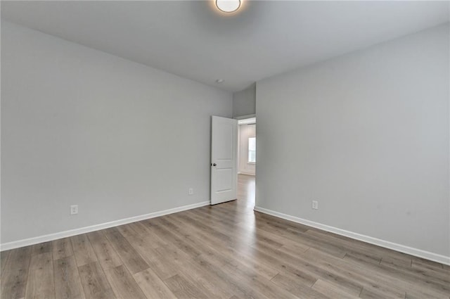 2090 Harvester Ln, Buford, GA 30518 - empty room featuring wood finished floors and baseboards