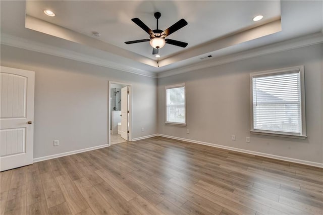 2090 Harvester Ln, Buford, GA 30518 - unfurnished room with a raised ceiling, a ceiling fan, ornamental molding, wood finished floors, and recessed lighting