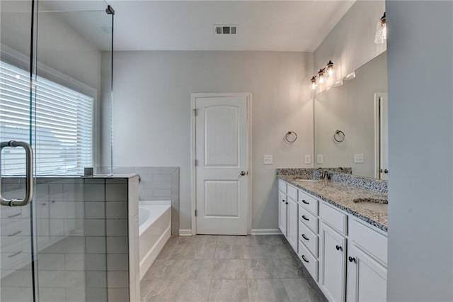 2090 Harvester Ln, Buford, GA 30518 - full bath featuring double vanity, a garden tub, tile patterned flooring, and a shower with shower door