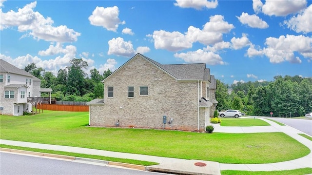 2090 Harvester Ln, Buford, GA 30518 - view of side of home with driveway and brick siding