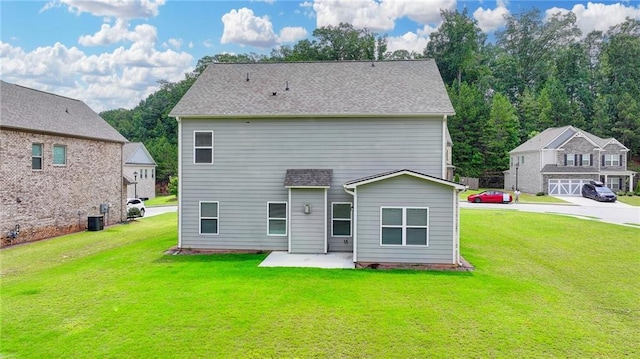 2090 Harvester Ln, Buford, GA 30518 - rear view of house with a lawn and a patio area