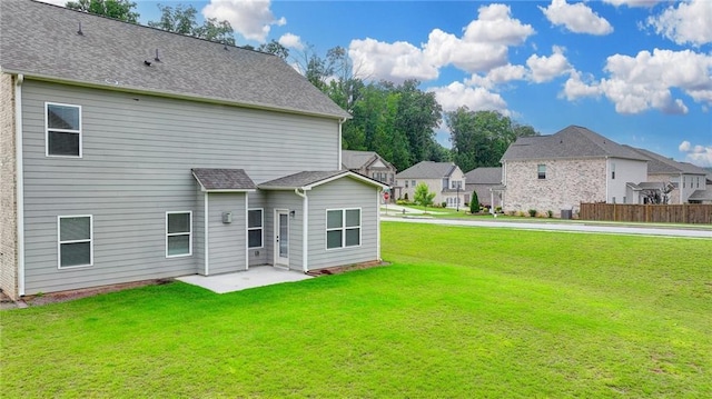 2090 Harvester Ln, Buford, GA 30518 - back of house featuring a residential view, a patio, and roof with shingles