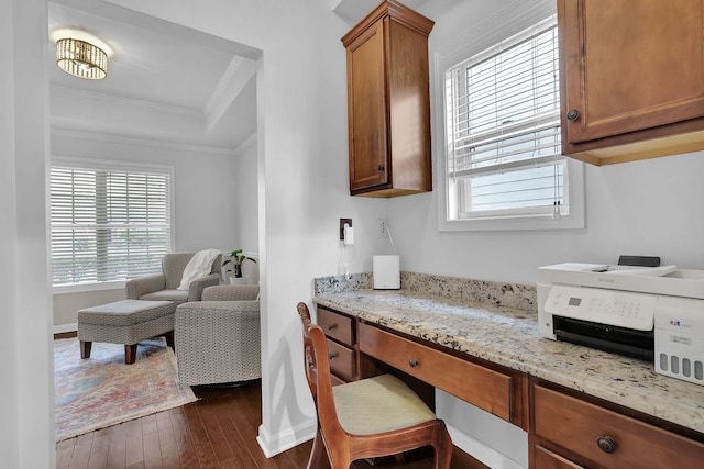 office with a tray ceiling, dark wood-type flooring, a wealth of natural light, and ornamental molding