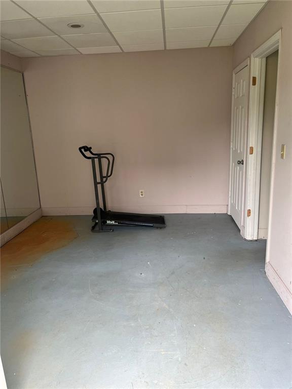 4567 Duncan Dr, Sugar Hill, GA 30518 - deck featuring stairway, a lawn, and view of wooded area