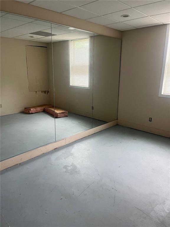 4567 Duncan Dr, Sugar Hill, GA 30518 - hall with wood finished floors, crown molding, a textured ceiling, and baseboards