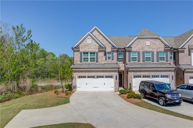 2378 Morgan Creek Rd, Buford, GA 30519 - view of front of property with brick siding, a garage, driveway, and a front lawn