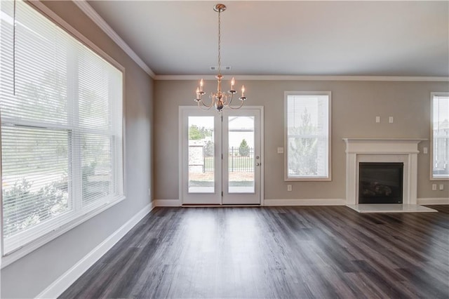2378 Morgan Creek Rd, Buford, GA 30519 - unfurnished living room featuring a chandelier, dark wood finished floors, crown molding, and a high end fireplace