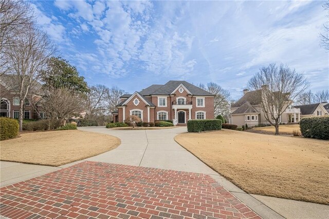 view of front of home with a front lawn