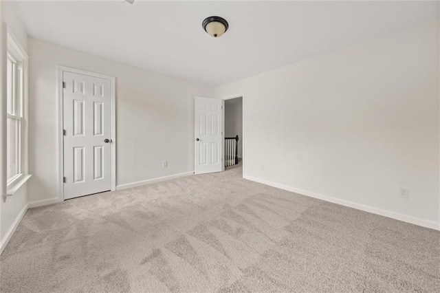 179 Hunters Crk, Dallas, GA 30157 - unfurnished bedroom featuring carpet and baseboards
