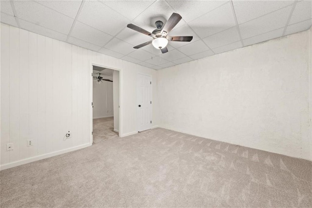 179 Hunters Crk, Dallas, GA 30157 - empty room with carpet floors, a paneled ceiling, and a ceiling fan
