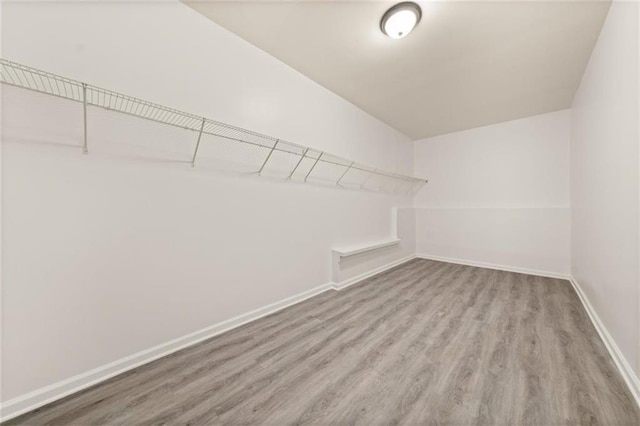 179 Hunters Crk, Dallas, GA 30157 - spacious closet featuring wood finished floors