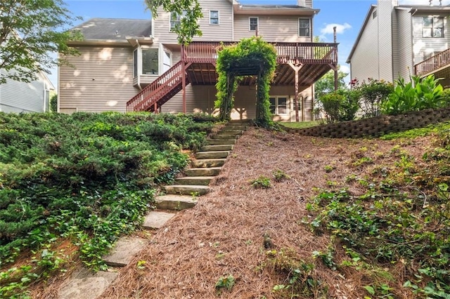 179 Hunters Crk, Dallas, GA 30157 - back of property featuring stairway and a wooden deck