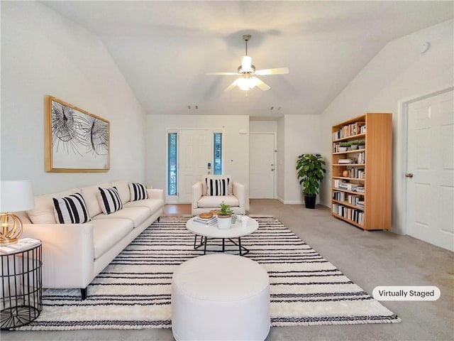 carpeted living room with lofted ceiling and ceiling fan