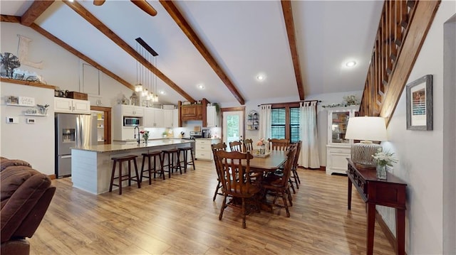 dining room featuring high vaulted ceiling, recessed lighting, a ceiling fan, light wood-type flooring, and beamed ceiling