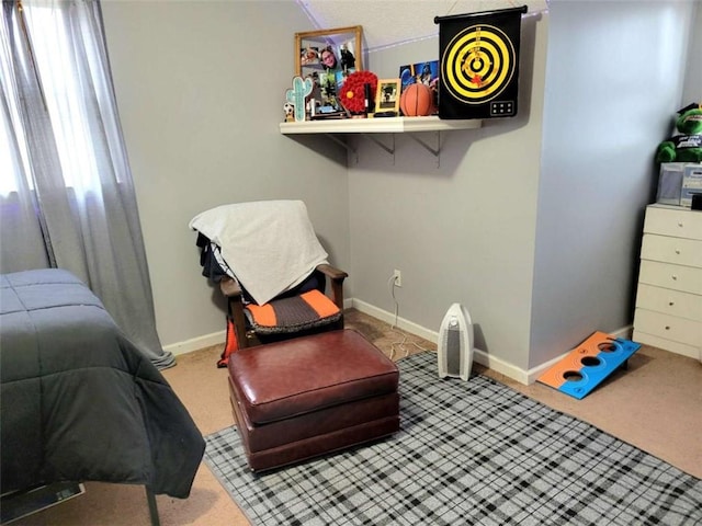 bedroom featuring carpet flooring and baseboards