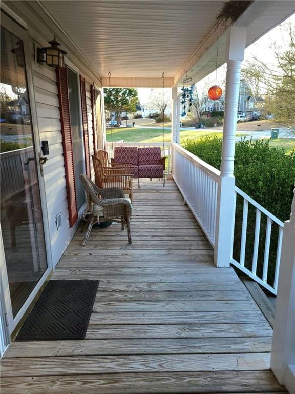 wooden terrace with covered porch