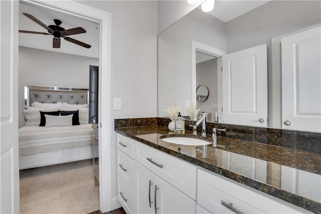 4550 Lois St SE, Smyrna, GA 30080 - ensuite bathroom with a ceiling fan and vanity