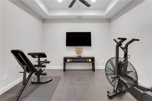 4550 Lois St SE, Smyrna, GA 30080 - workout room featuring a raised ceiling, ceiling fan, and baseboards