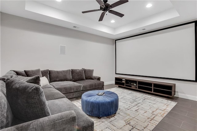 4550 Lois St SE, Smyrna, GA 30080 - home theater featuring a tray ceiling, recessed lighting, baseboards, and a ceiling fan