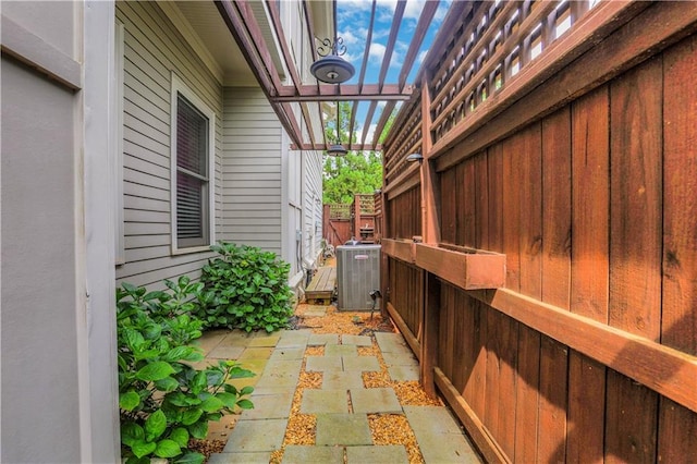 4550 Lois St SE, Smyrna, GA 30080 - view of patio / terrace featuring cooling unit