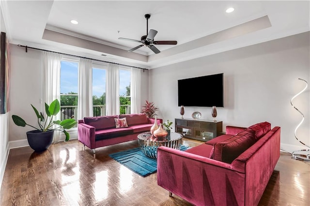4550 Lois St SE, Smyrna, GA 30080 - living room featuring a raised ceiling, a ceiling fan, baseboards, recessed lighting, and wood finished floors
