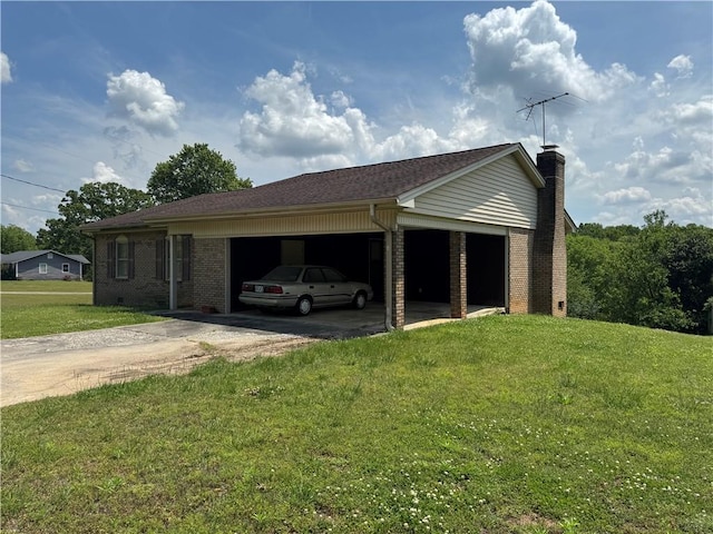 view of home's exterior with concrete driveway, a lawn, brick siding, and a garage