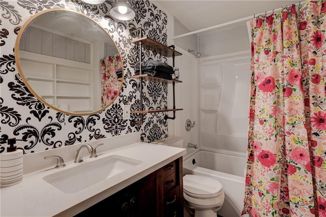 full bathroom featuring vanity, toilet, and shower / bath combo with shower curtain