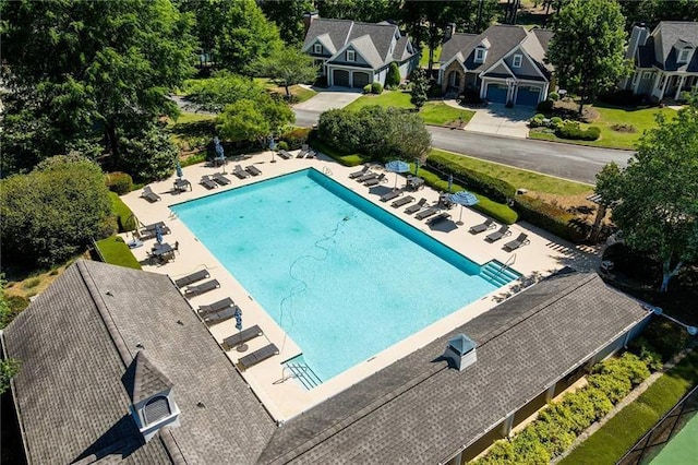 view of swimming pool with a patio area