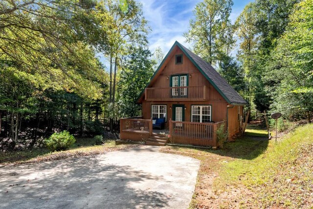 view of front of house with a deck