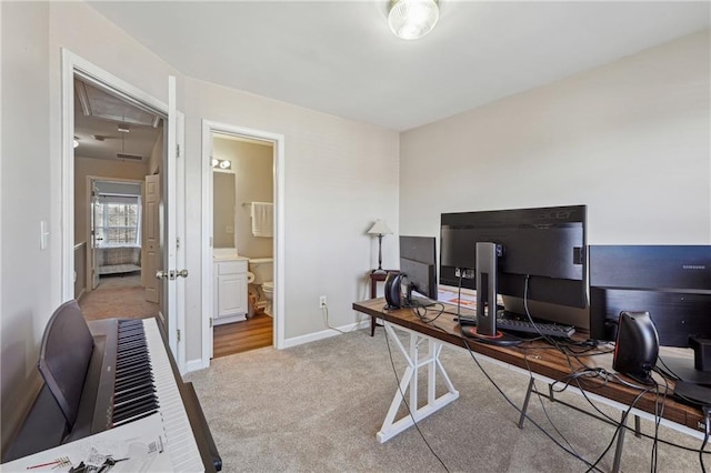 home office with carpet flooring and baseboards