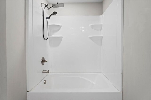 165 Twin Lakes Dr, Covington, GA 30016 - bathroom featuring bathing tub / shower combination